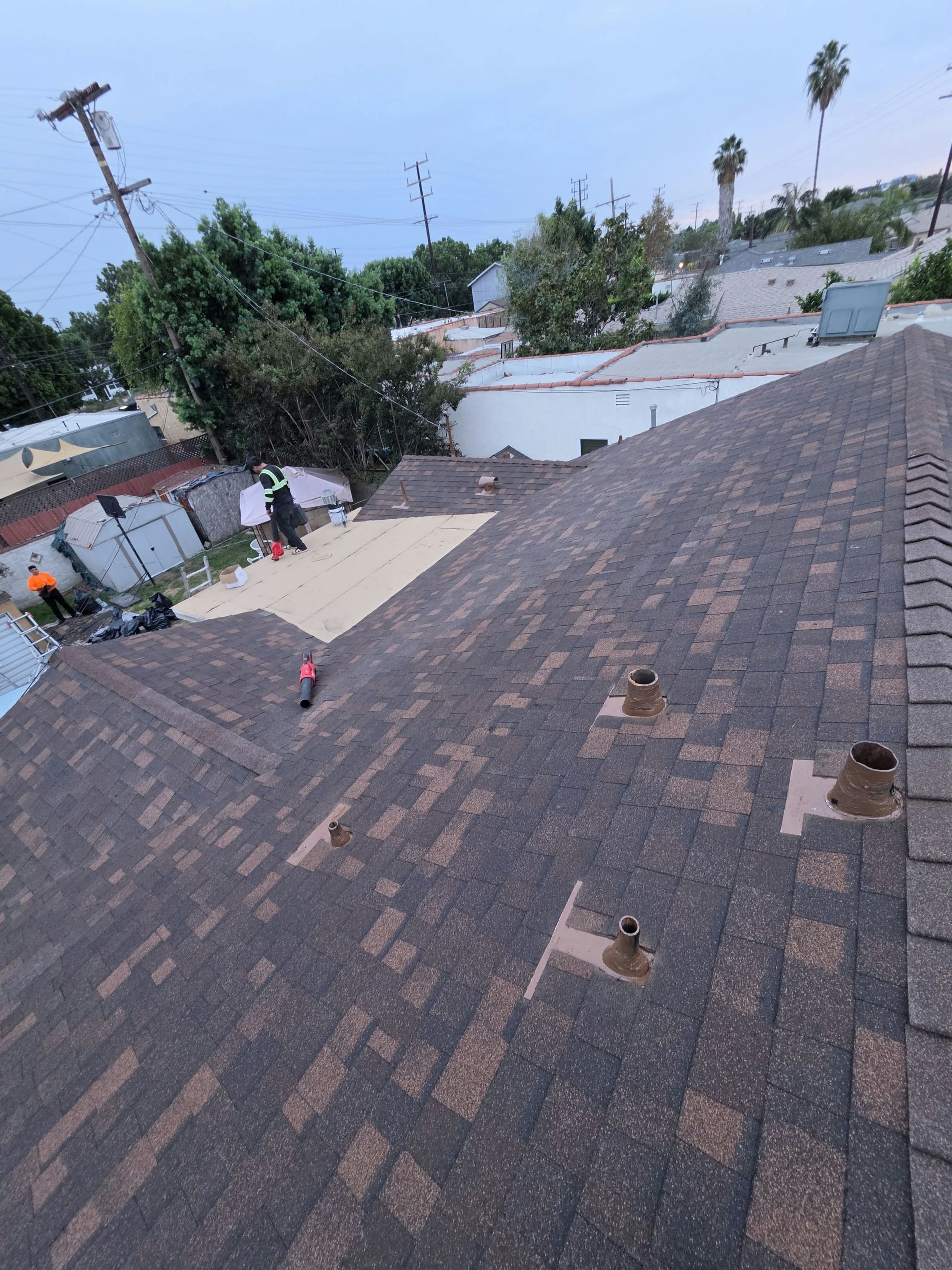 Roofing & Renovations logo